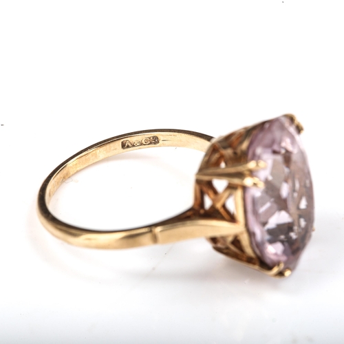 387 - A late 20th century 9ct gold pink stone dress ring, set with oval mixed-cut stone, length 16.1mm, si... 