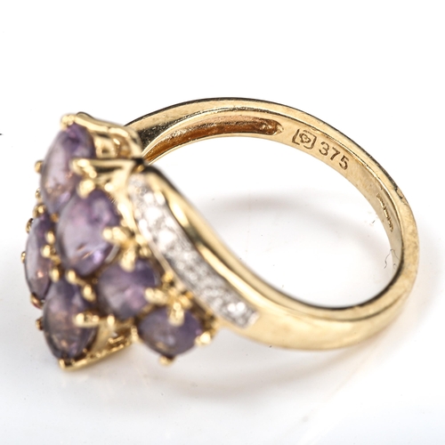 388 - A modern 9ct gold amethyst and diamond crossover ring, set with oval mixed-cut amethyst and single-c... 