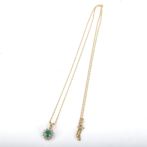 392 - A modern 9ct gold emerald and diamond oval cluster pendant necklace, set with oval mixed-cut emerald... 