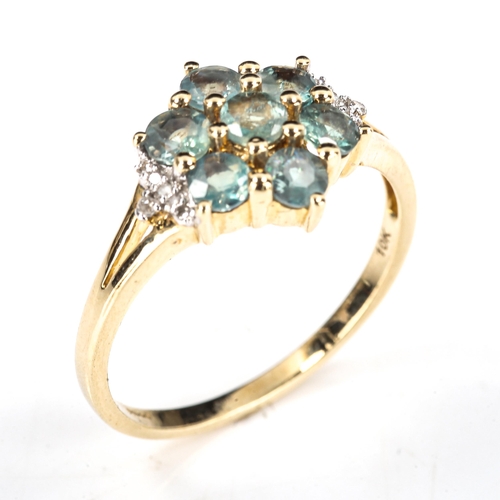 393 - A modern 9ct gold emerald and diamond cluster flowerhead dress ring, set with round-cut emerald and ... 