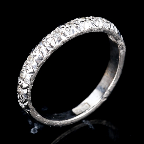 394 - An 18ct white gold diamond half eternity ring, set with single-cut diamonds, total diamond content a... 