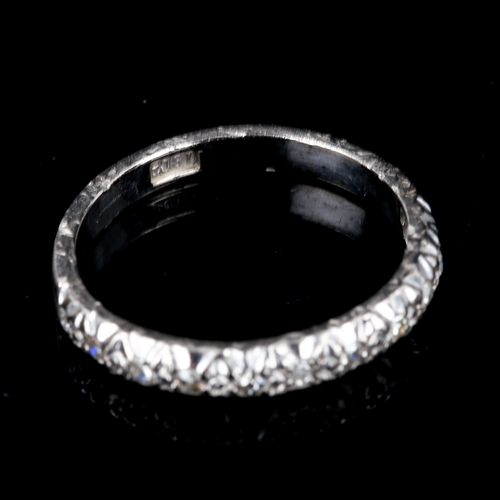 394 - An 18ct white gold diamond half eternity ring, set with single-cut diamonds, total diamond content a... 