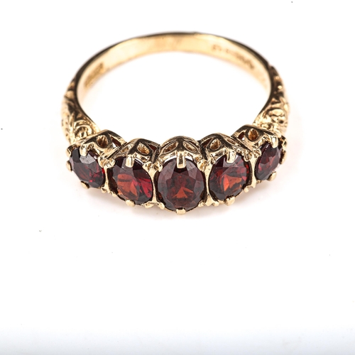 397 - A late 20th century 9ct gold graduated 5-stone garnet half hoop ring, set with oval and round-cut ga... 