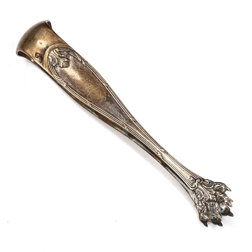 411 - A pair of 19th century French silver-gilt lion paw sugar tongs, length 13.5cm