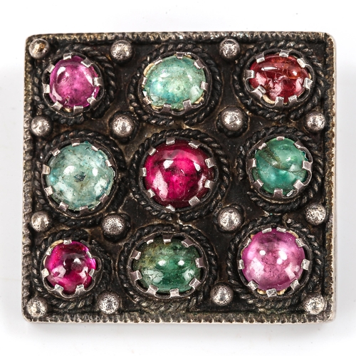 413 - An Arts and Crafts unmarked silver gem set square panel brooch, set with cabochon gem stones, brooch... 