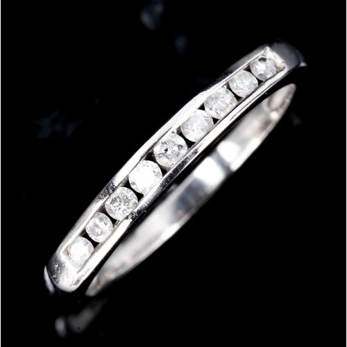 425 - A modern 9ct white gold diamond half eternity ring, set with modern round brilliant-cut diamonds, to... 