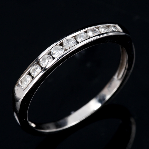 425 - A modern 9ct white gold diamond half eternity ring, set with modern round brilliant-cut diamonds, to... 