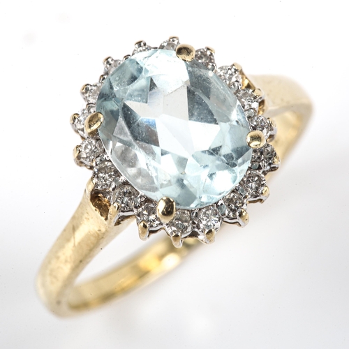 431 - A modern 9ct gold blue topaz and diamond oval cluster ring, set with oval mixed-cut topaz and modern... 