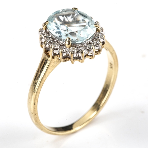 431 - A modern 9ct gold blue topaz and diamond oval cluster ring, set with oval mixed-cut topaz and modern... 