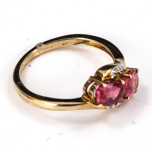 442 - A modern 9ct gold pink tourmaline and diamond crossover ring, set with oval mixed-cut tourmaline and... 