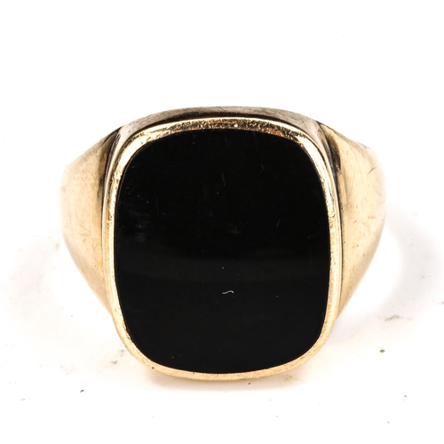 450 - A large Scandinavian 14ct gold black onyx signet ring, maker's marks GIFA, setting height 18.5mm, si... 