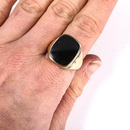 450 - A large Scandinavian 14ct gold black onyx signet ring, maker's marks GIFA, setting height 18.5mm, si... 