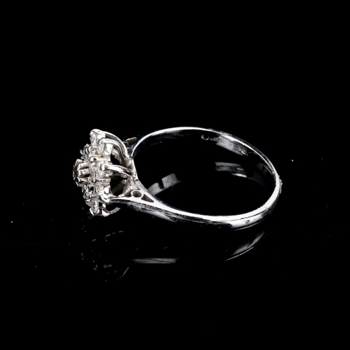 459 - A modern 18ct white gold diamond cluster snowflake dress ring, set with old and single-cut diamonds,... 