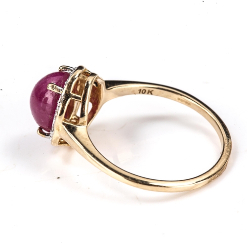 470 - A modern 9ct gold cabochon ruby and diamond cluster ring, set with oval cabochon ruby and single-cut... 