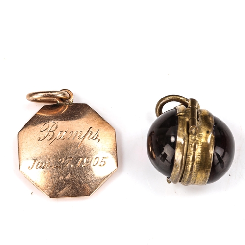 472 - A small Edwardian unmarked gold locket pendant, and a double-sided cabochon garnet locket fob, penda... 