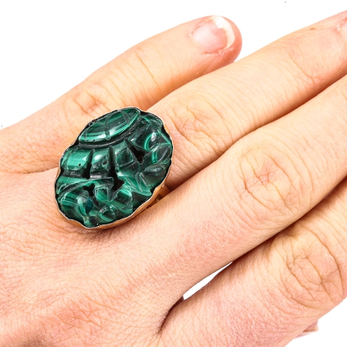 475 - A modern silver-gilt malachite dress ring, setting height 25.7mm, size O, 12.6g