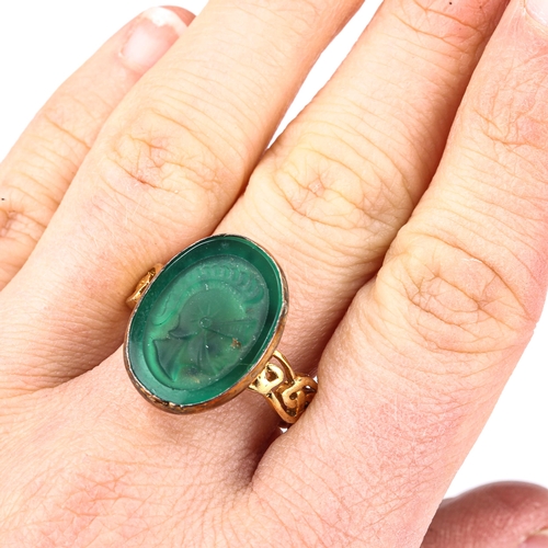 476 - A modern silver-gilt green agate seal ring, intaglio carved with centurion profile, setting height 2... 