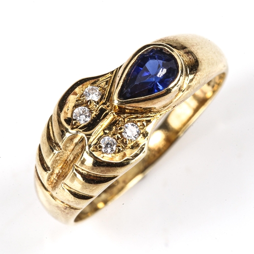 477 - A modern 14ct gold sapphire and cubic zirconia dress ring, setting height 8.4mm, size N, 3g