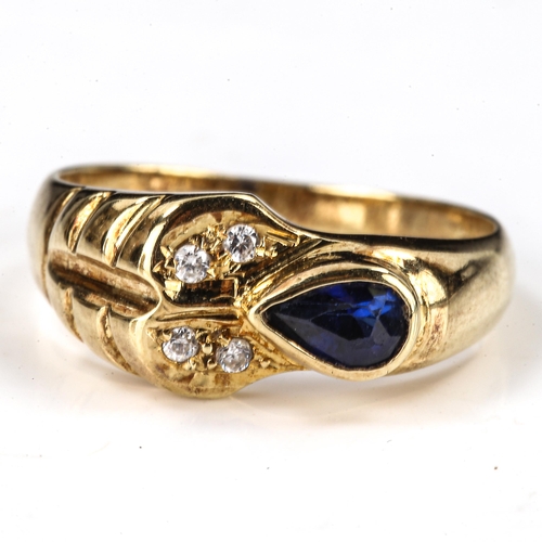 477 - A modern 14ct gold sapphire and cubic zirconia dress ring, setting height 8.4mm, size N, 3g