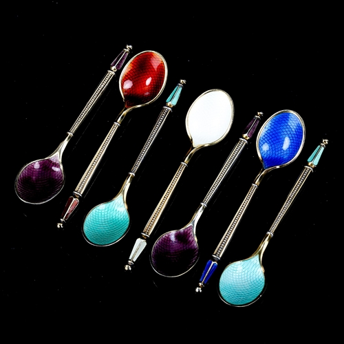 485 - ANTON MICHELSEN - a set of 7 Danish vermeil sterling silver and harlequin enamel coffee spoons, leng... 