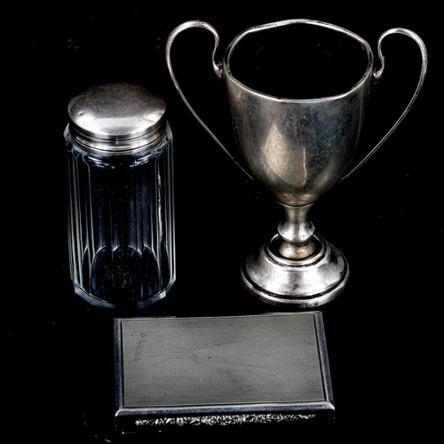 489 - An Austro-Hungarian silver cigarette case, English silver trophy, and silver-topped glass toilet jar... 