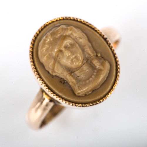 505 - An Antique 9ct gold lava cameo ring, relief carved depicting female bust, setting height 12.8mm, siz... 