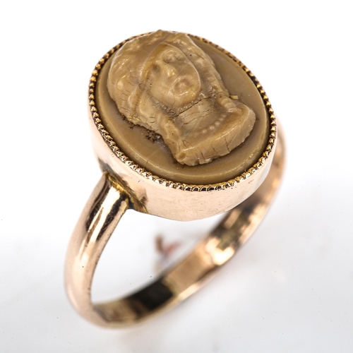 505 - An Antique 9ct gold lava cameo ring, relief carved depicting female bust, setting height 12.8mm, siz... 