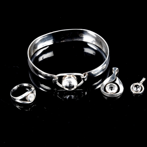 516 - 4 Scandinavian sterling silver cubic zirconia items of jewellery, comprising torque bangle, ring and... 