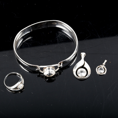 516 - 4 Scandinavian sterling silver cubic zirconia items of jewellery, comprising torque bangle, ring and... 