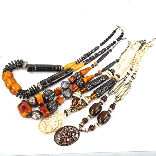 520 - A quantity of Tribal jewellery, including lacquer and bone