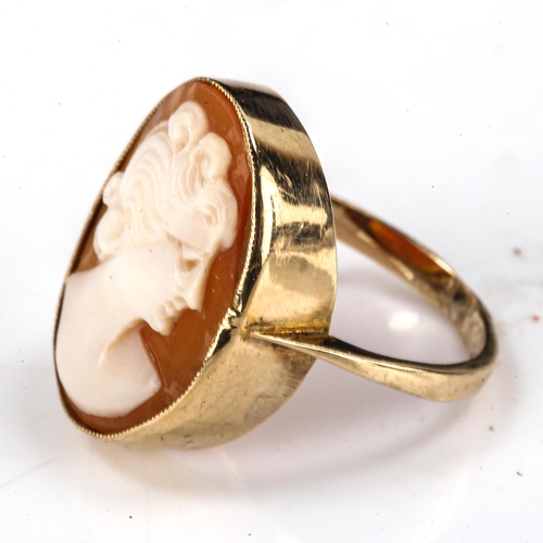 530 - A child's relief carved shell cameo ring, unmarked gold settings, setting height 16.4mm, size C, 2g