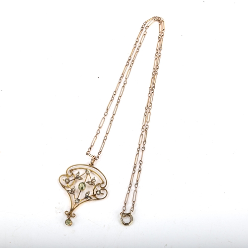 536 - An Edwardian 9ct gold peridot and pearl openwork pendant necklace, on unmarked yellow metal bar and ... 