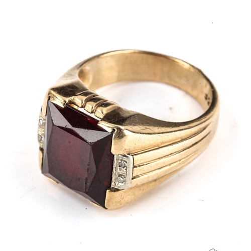 537 - A large American 9ct gold rubellite and diamond signet ring, setting height 15.6mm, size S, 11.4g