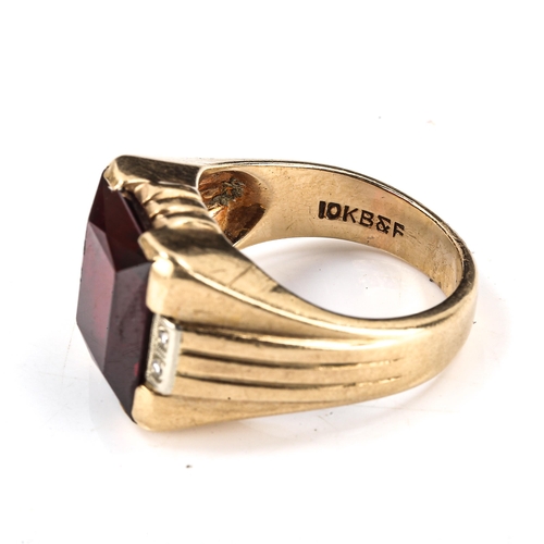 537 - A large American 9ct gold rubellite and diamond signet ring, setting height 15.6mm, size S, 11.4g