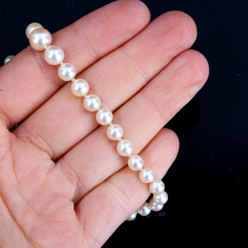 544 - A single-strand graduated pearl necklace, on 9ct clasp, necklace length 38cm, 13.3g