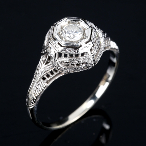 547 - An 18ct white gold 0.25ct solitaire diamond ring, setting height 10.8mm, size Q, 2.7g