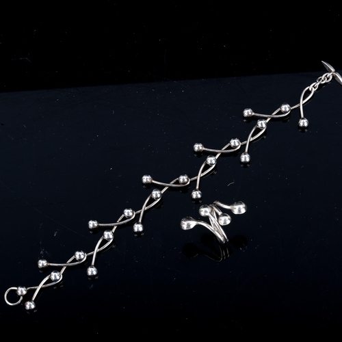 556 - NIELS ERIK FROM - a Danish sterling silver abstract ball bracelet, length 20cm, and a similar unname... 