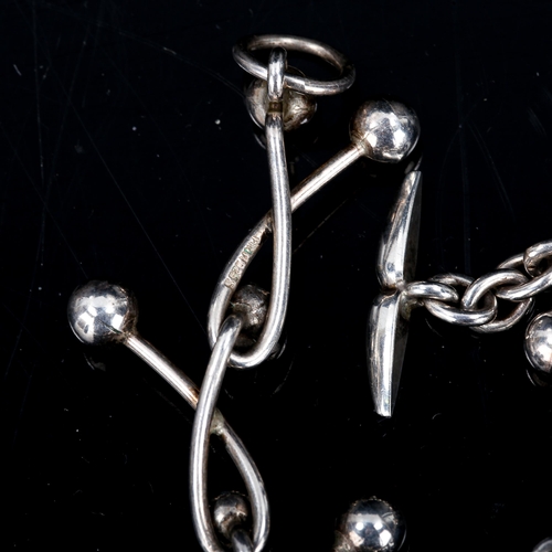 556 - NIELS ERIK FROM - a Danish sterling silver abstract ball bracelet, length 20cm, and a similar unname... 