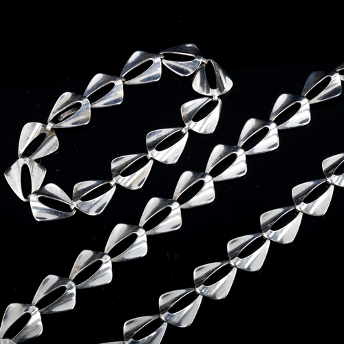 558 - NIELS ERIK FROM - a Vintage Danish stylised sterling silver Delta Wing pattern matching necklace and... 