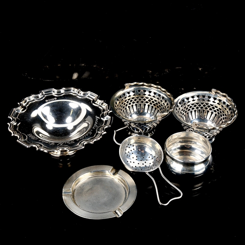 571 - Various silver, including tea strainer and stand, engine turned ashtray, pair of pierced baskets etc... 