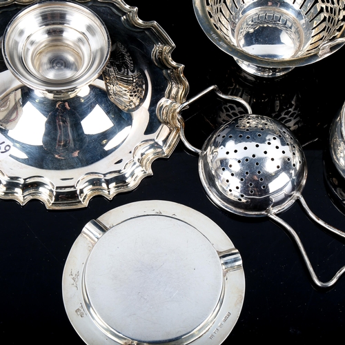 571 - Various silver, including tea strainer and stand, engine turned ashtray, pair of pierced baskets etc... 