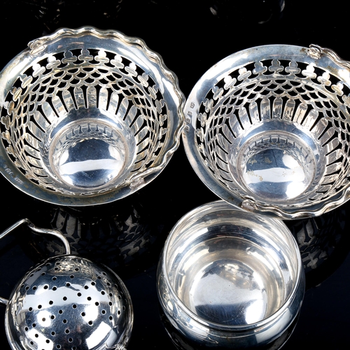 571 - Various silver, including tea strainer and stand, engine turned ashtray, pair of pierced baskets etc... 