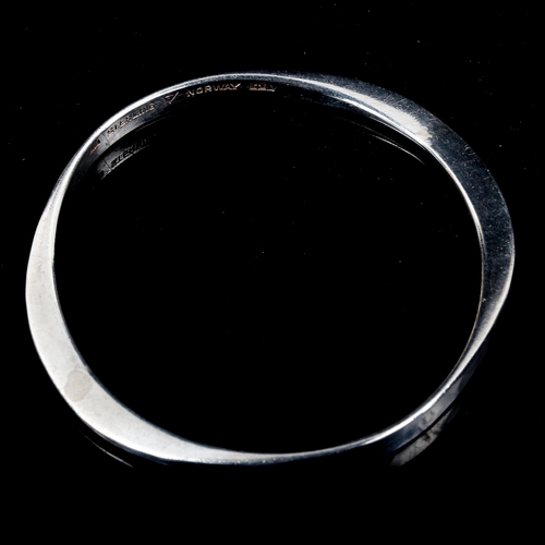 575 - TONE VIGELAND - a Norwegian stylised sterling silver slave bangle, band width 5.7mm, internal diamet... 