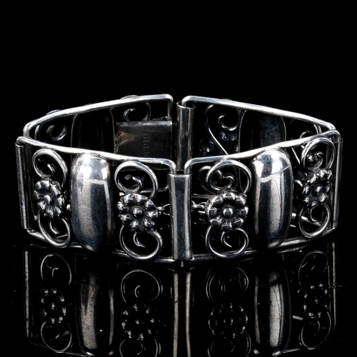 583 - F HANSEN - a Vintage Danish stylised silver floral panel bracelet, length 16cm, 42.1g