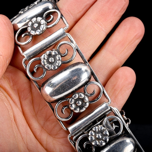 583 - F HANSEN - a Vintage Danish stylised silver floral panel bracelet, length 16cm, 42.1g