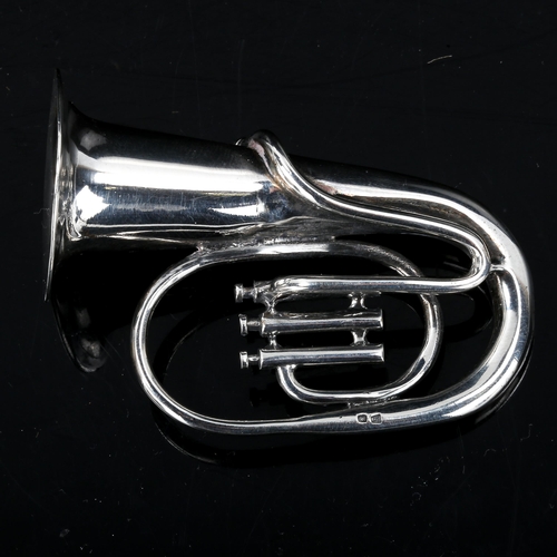 591 - A miniature Continental silver tuba instrument model, marked 835, length 6.5cm, 1.4oz, in fitted cas... 