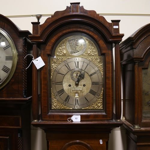 63 - JOHN WORSFOLD OF DORKING - an early 19th century flame mahogany 8-day longcase clock, arch-top brass... 