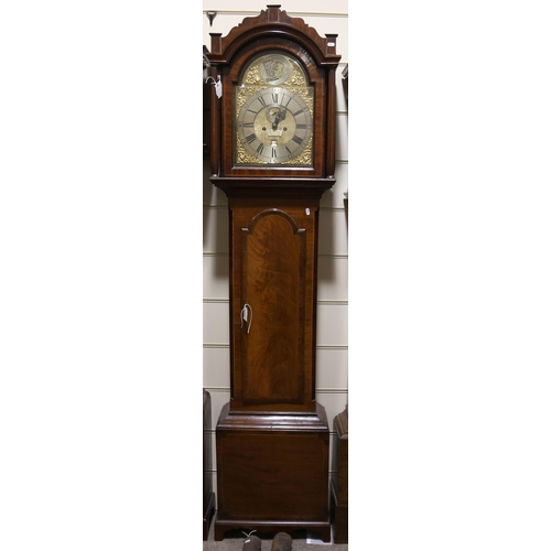 63 - JOHN WORSFOLD OF DORKING - an early 19th century flame mahogany 8-day longcase clock, arch-top brass... 