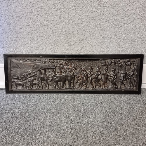 1001 - An 18th century relief carved oak wall plaque, depicting Noah's Ark, framed, overall 24cm x 82cm