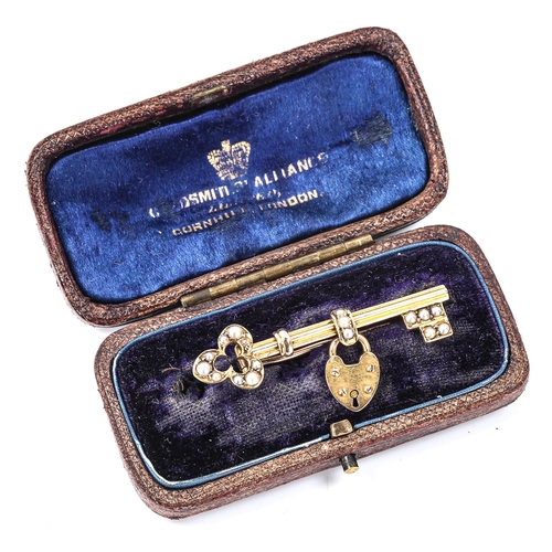 236 - A Victorian pearl 'key to my heart' sweetheart brooch, unmarked gold settings with padlock drop, key... 